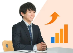 成長を示す右肩上がりのグラフと男性